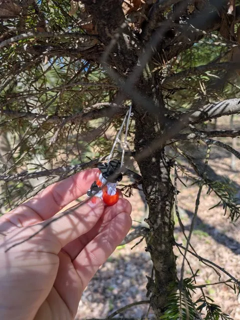 The snowman has a full knapsack.